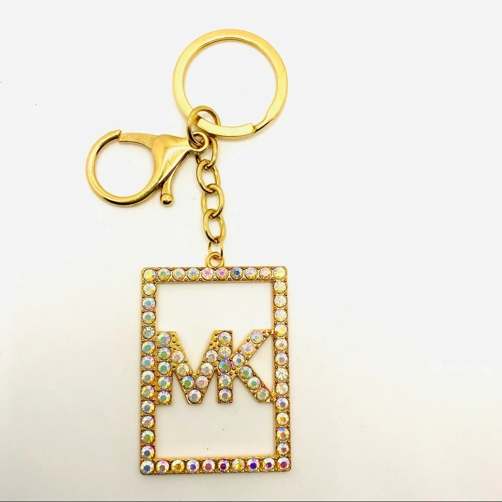 Purse Charm Key Chain MK in Iridescent Crystals set in golden tone. BRAND NEW